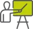 Icono de una persona de pie frente a un pizarrón verde con un puntero, representando capacitación o presentación.