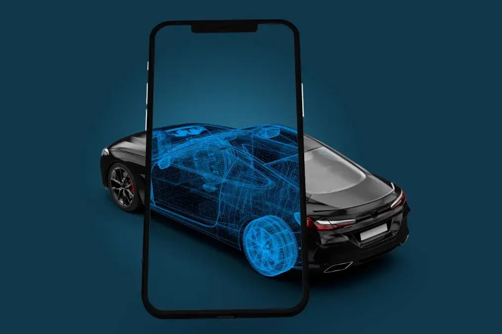 Representación digital de un automóvil vista a través de un teléfono móvil