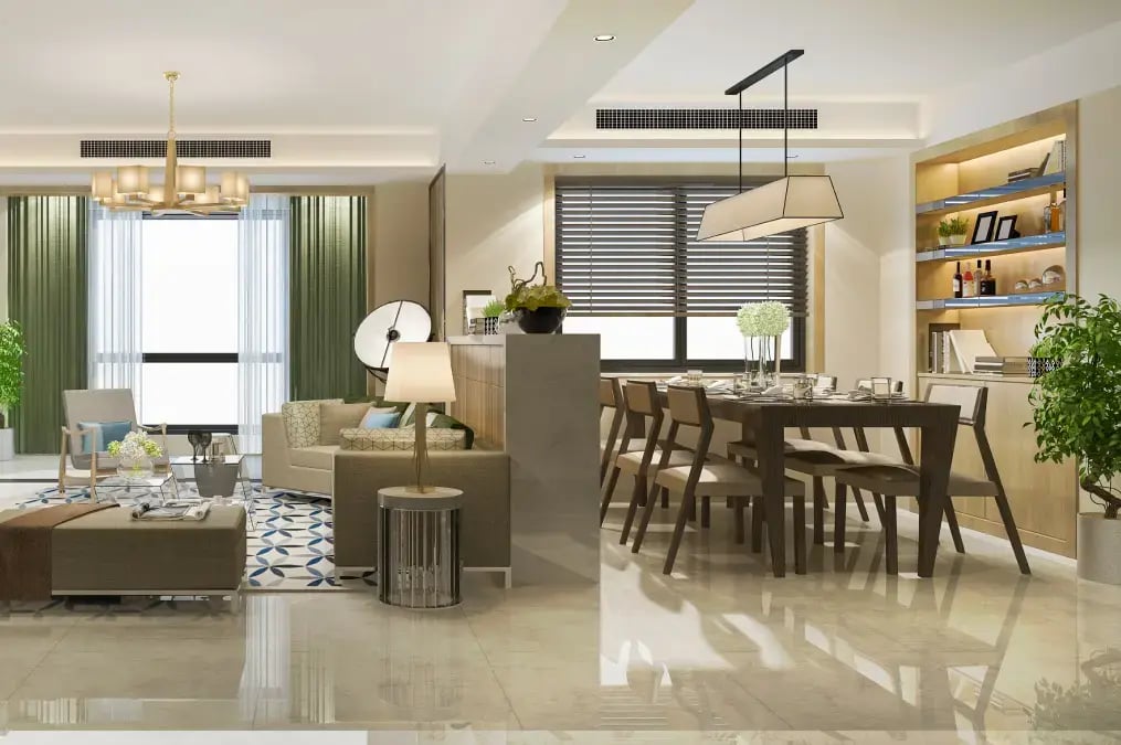 Sala y comedor elegantes con muebles modernos, ventanales amplios y decoración en tonos verdes y beige.