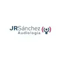 Logotipo de JR Sánchez Audiología con ícono de señal auditiva en color magenta y azul